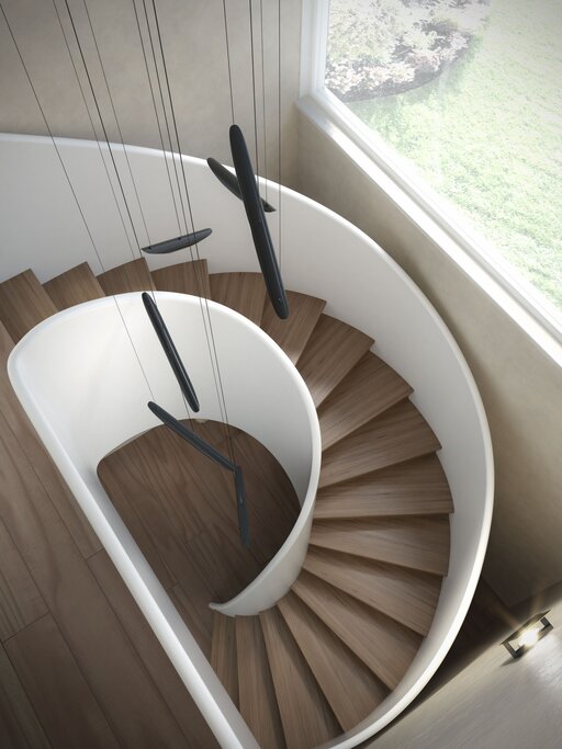 Tornado – Escalera de madera curvada con líneas fluidas y orgánicas